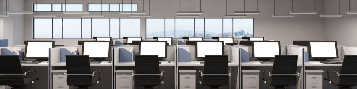 Modern office with rows of computer desks